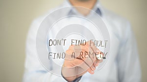 Don't Find Fault, Find a Remedy, Man writing on transparent screen