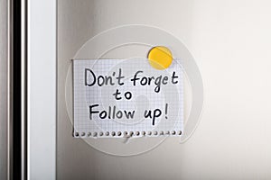Don`t Forget To Follow Up Note With Yellow Magnetic Thumbtack