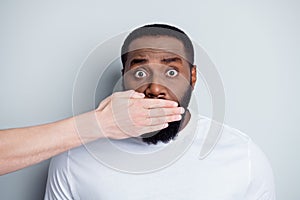 Don`t speak. Photo of helpless african american guy unfairly society shut up black race citizens white skin arm close