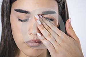 Don`t Touch Your Face. Girl rubbing her eye with dirty hands.Precautions, Avoid Touching Your Eyes. Woman rubbing her eye