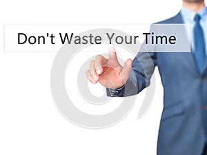 Don`t Waste Your Time - Businessman hand pressing button on touc