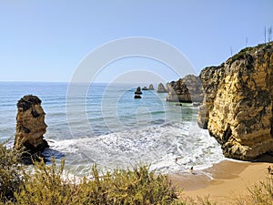 Dona Ana beach cliffs and sea in Lagos Portugal