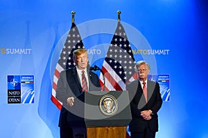 Donald Trump, President of United States of America and John R. Bolton, during press conference at NATO SUMMIT 2018.