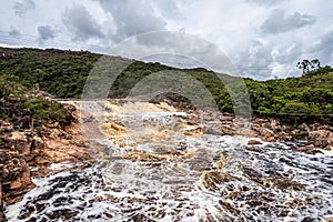 Donana Waterfall in Paraguassu River with dark waters in Andarai, Chapada Diamantina, Bahia in Brazil