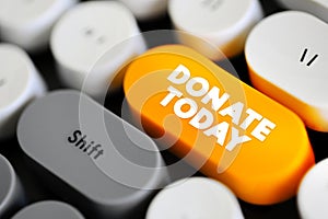 DONATE TODAY text concept button on keyboard for presentations and reports