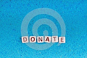 Donate word on stone