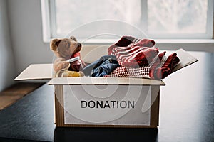 Donation box, Charity Gift hampers, Help Refugees and homeless. Christmas Xmas Charity Donation box with warm clothes photo