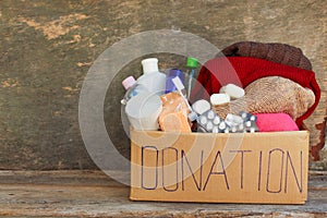 Donation box with clothes, living essentials