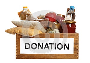 Donation box full of different products on white