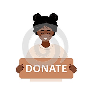 Donation and charity concept. African volunteer woman holding in hands cardboard sign Donate. Support for homeless and