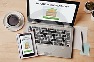 Donation concept on laptop and smartphone screen