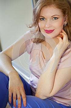 Donation Concept. Woman holding a Donate Box with full of Clothes