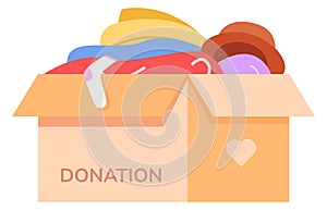 Donation icon. Cardboard box with clothes. Charity symbol