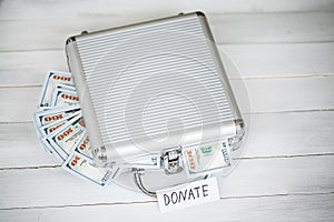Donations and Charity. Donation Concept. A Donation Box on the White Background