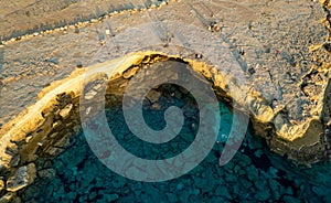 Done scenery of Cape Greko or Cape Greco sea caves Ayia Napa Cyprus. Tourist people doing sightseeing