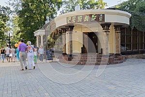 Donetsk, Ukraine - August 26, 2018: Citizens on Pushkin Boulevard near a cafe