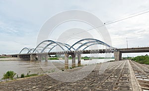 Tru bridge crossing Red River in Hanoi, Vietnam photo