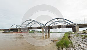 Tru bridge crossing Red River in Hanoi, Vietnam photo