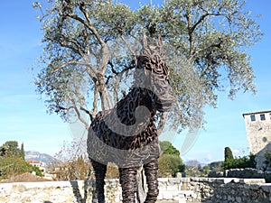 A donkey statue feature in Nice, France made of horseshoes and metals