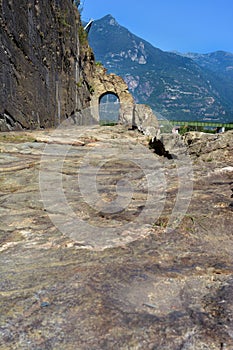 Donnas, Aosta, Aosta Valley,.07-18-2022-The ancient Roman route named Via delle Gallie and its Arch