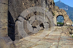 Donnas, Aosta, Aosta Valley,.07-18-2022-The ancient Roman route named Via delle Gallie and its Arch