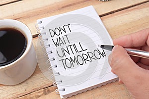 Dont wait until tomorrow, text words typography written on book, life and business motivational inspirational concept