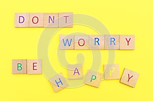 Dont worry be happy, message on yellow paper