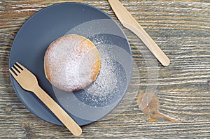 Donut berliner and cutlery