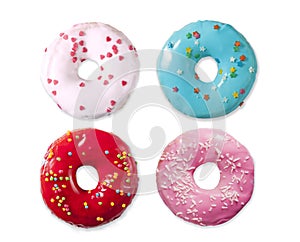 Donut with colorful sprinkles isolated on white background. Top view