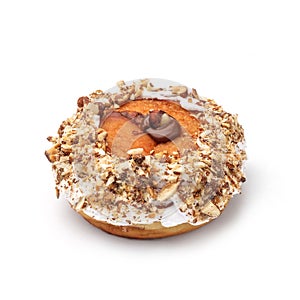 Donut with cream and hazelnut core. View from a forty-five degree angle. Isolated image