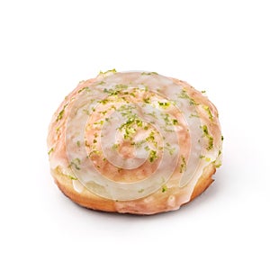 Donut glazed with sugar and leaf of mind. View from a forty-five degree angle. Isolated image