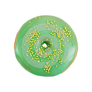 Donut with green glaze and yellow sprinkles isolated