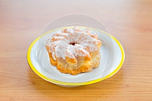 Donut with icing knows in Poland as gniazdko.