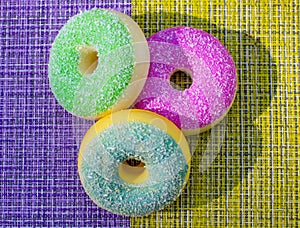 Donut. Sweet icing sugar food. Dessert colorful snack. Glazed sprinkles.