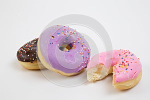 Donut. Sweet icing sugar food. Dessert colorful snack. Glazed sprinkles. Treat from delicious pastry breakfast. Bakery cake.