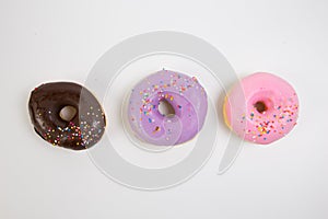 Donut. Sweet icing sugar food. Dessert colorful snack. Glazed sprinkles. Treat from delicious pastry breakfast. Bakery cake.