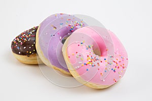 Donut. Sweet icing sugar food. Dessert colorful snack. Glazed sprinkles. Treat from delicious pastry breakfast. Bakery cake.