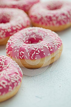 Donut. Sweet icing sugar food. Dessert colorful snack. Glazed sprinkles. Treat from delicious pastry breakfast. Bakery