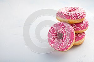 Donut. Sweet icing sugar food. Dessert colorful snack. Treat from delicious pastry breakfast. Bakery cake. Doughnut with frosting.