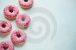 Donut. Sweet icing sugar food. Dessert colorful snack.Treat from delicious pastry breakfast. Bakery cake. Doughnut with frosting.