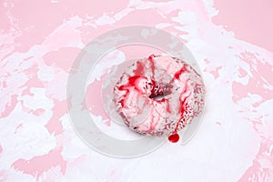 donut on a white and pink background