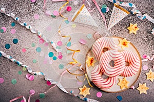 Donuts for carnival and party. German Krapfen or donuts with streamers and confetti