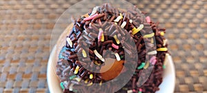 donuts with chocolate meses topping photo