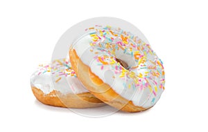 Donuts close up. Two Sweet Tasty colorful glazed donuts closeup. Doughnut isolated on white background