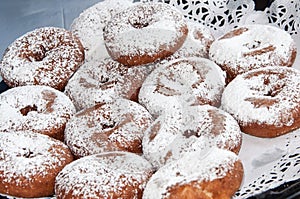 Donuts covered with confectioners sugar