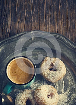 Donuts and cup of coffee.