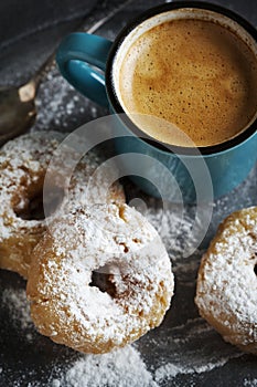 Donuts and cup of coffee.