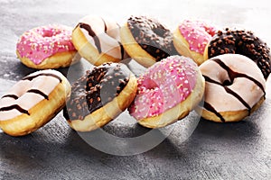 Donuts in different glazes frosted with sprinkles