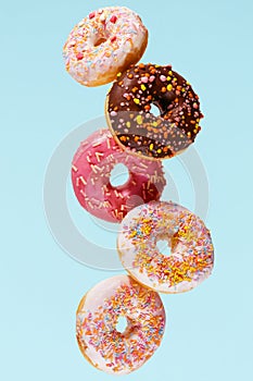 Donuts. Doughnuts On Blue Background photo