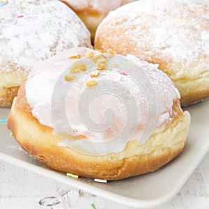 Donuts with frosting and powdered sugar
